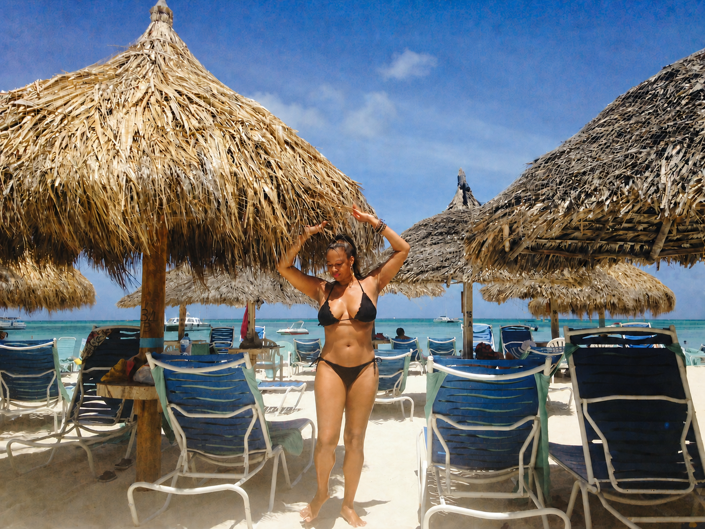 Sajuan enjoying a bright beach day in Aruba